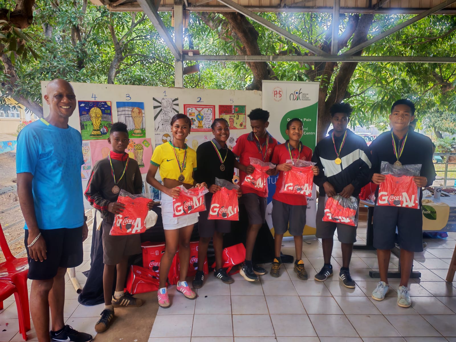 Price giving for art competition and football winning team